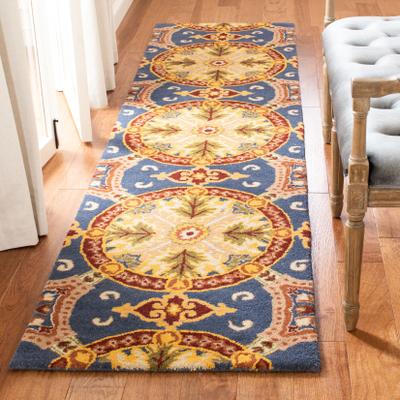 SAFAVIEH Handmade Wyndham Clemencia Modern Wool Rug