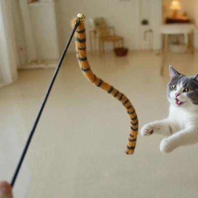 Uplifted Finds Tiger Stripe Faux Fur Plush Worm Tail Teaser Wand Tiger Stripe Faux Fur Plush Worm Tail Teaser Wand