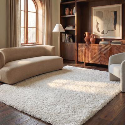 SAFAVIEH Handmade South Beach Leonella Shag Solid Polyester Rug