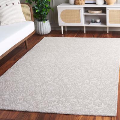 SAFAVIEH Hand-Tufted Ebony Melia Modern & Contemporary Wool Rug