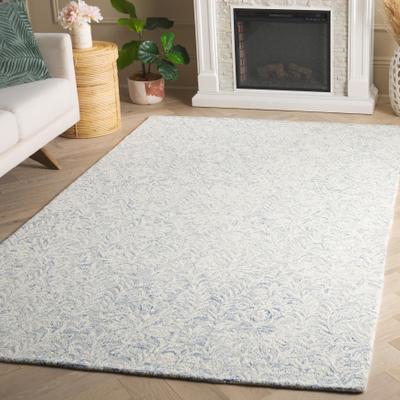 SAFAVIEH Hand-Tufted Ebony Melia Modern & Contemporary Wool Rug