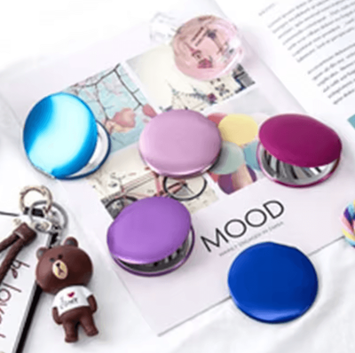Inspire Curations Portable Magnifying Compact Makeup Mirror any Two Of Them.