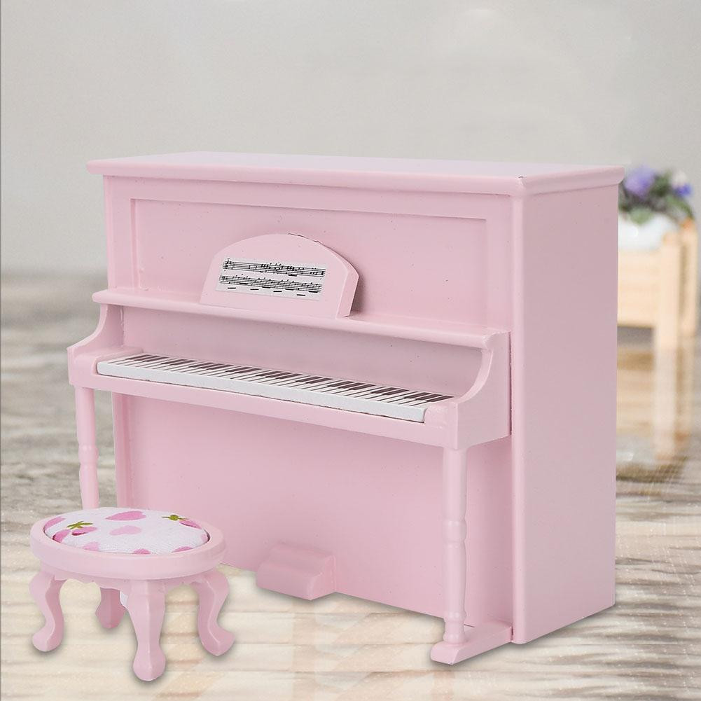 Cocosity Poppenhuisaccessoires Miniatuur rechtopstaande piano met krukje Roze 1:12