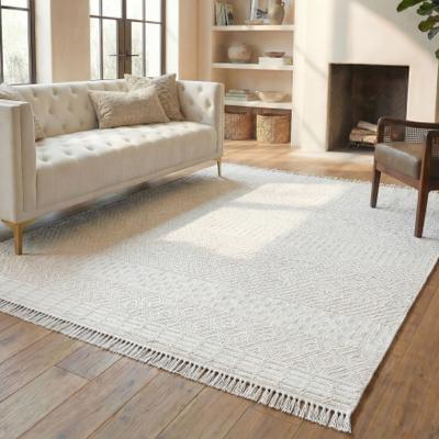 SAFAVIEH Handmade Natura Chiang Wool Fringe Rug