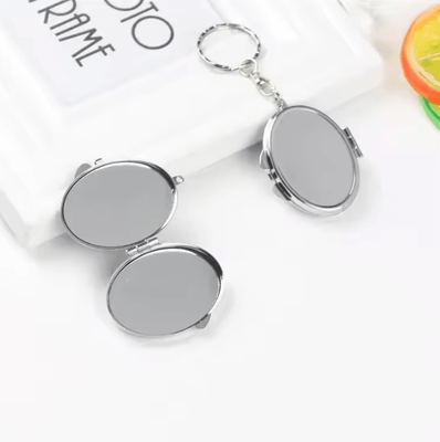Inspire Curations Mini Double Sided Keychain Makeup Mirror ellipse