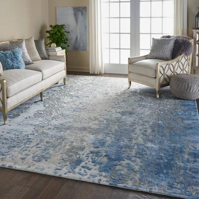 Nourison Prismatic Shimmering Carved Blue Ivory Abstract Area Rug