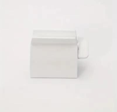 Inspired Living Compact Rolling Toothpaste Tube Squeezer Effortless, Waste Free Dispensing white