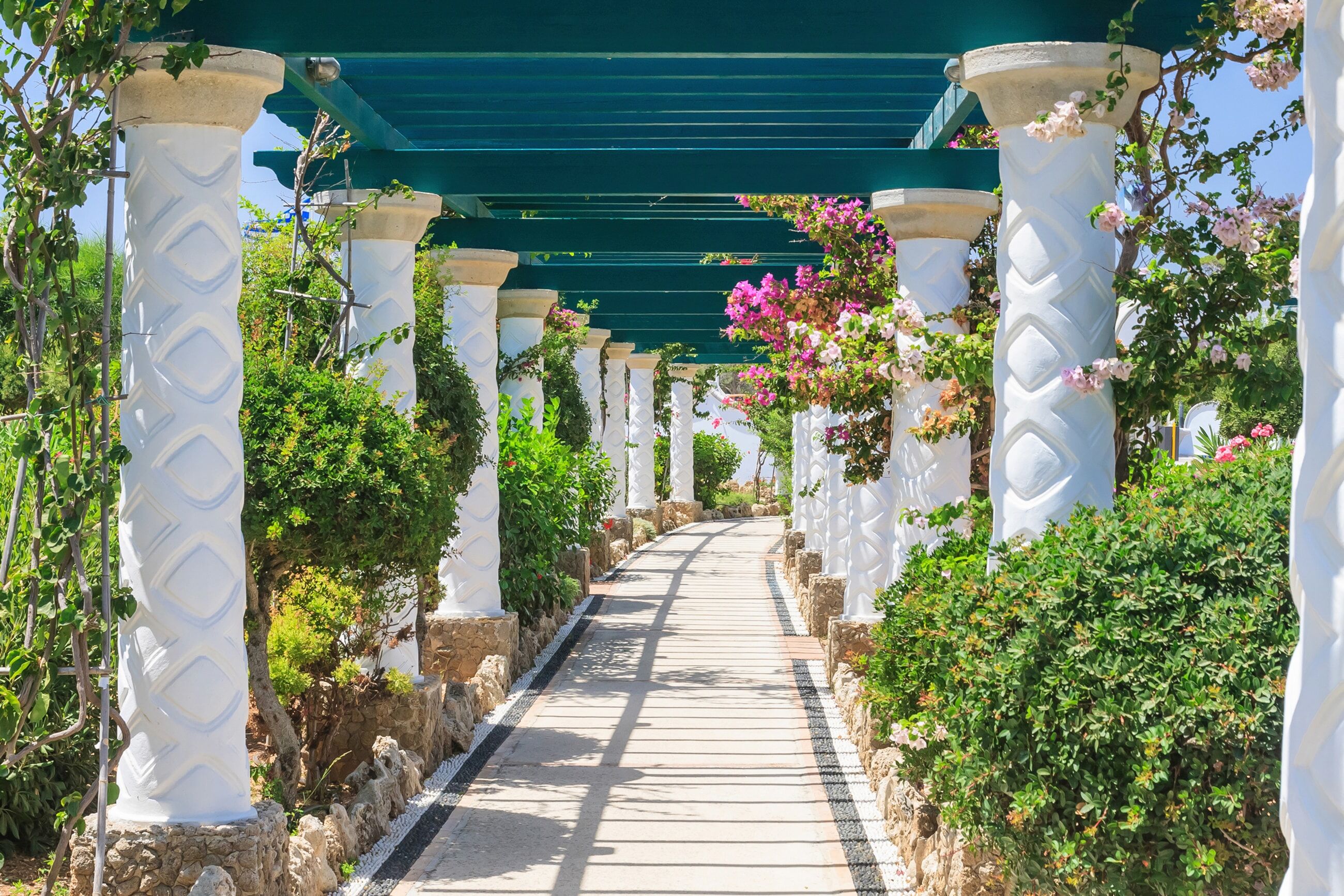 Fototapete PAPERMOON "PERGOLA-TERME KALITHEA GRIECHENLAND SÄULEN BLUMEN SONNE", bunt, B:1,5m L:1,11m, Vlies, Tapeten, Fototapete bunt B/L: 1,5m x 1,11m, Bahnen: 7 Stk.