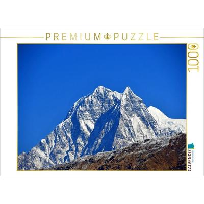 CALVENDO Puzzle Nilgiri Nord (7061 m) und Nilgiri Süd (6839 m) von links vom Bergdorf Ghorepani (2870 m) | 1000 Teile Lege-Größe 64x48cm Foto-Puzzle
