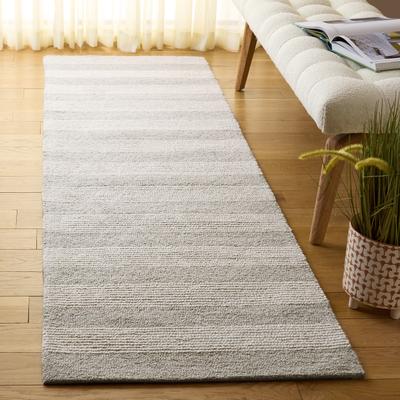 SAFAVIEH Handmade Pine Puck Modern Wool Rug