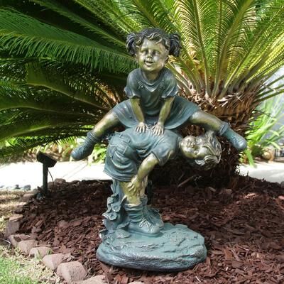 Alpine Corporation 26"" Tall Indoor/Outdoor Girl Jumping Over Boy Statue Yard Art Decoration"