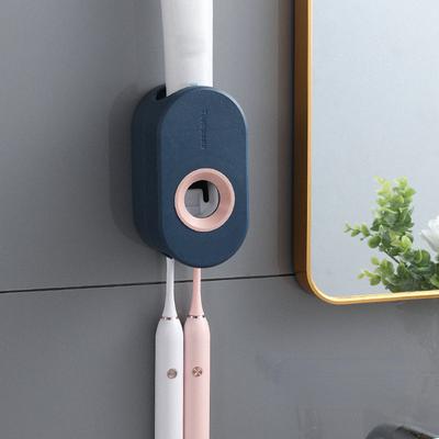 Inspire Daily Merch Automatic Toothpaste Dispenser Squeezer Bathroom Dust proof Wall mounted Holder pink
