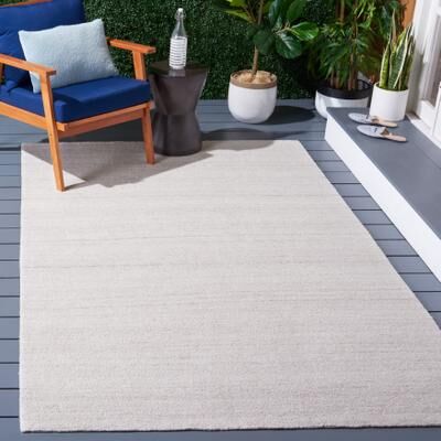 SAFAVIEH Handmade Outdoor Micro-Loop Zejxhane Rug