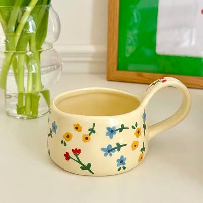 Uplifted Goods Cream Flower Ceramic Mug c 10.1 Oz.