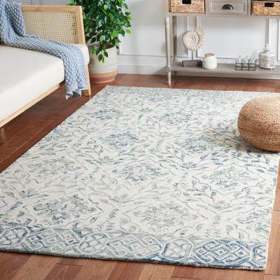 SAFAVIEH Handmade Dip Dye Nicki Floral Wool Rug