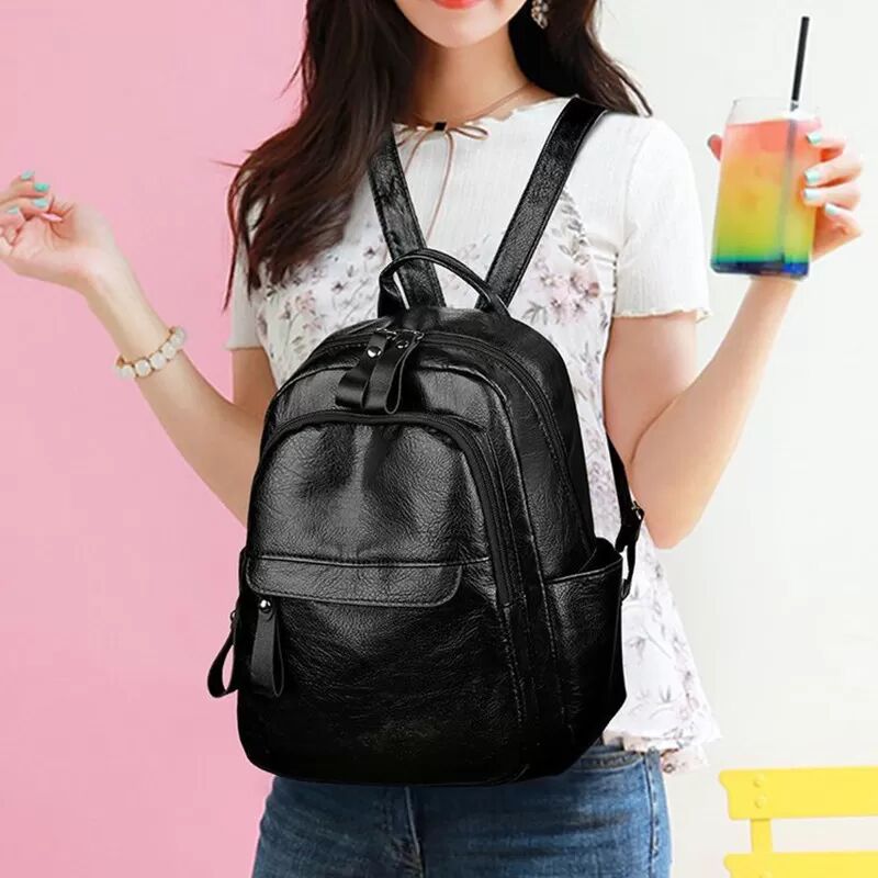 INF Stylischer schwarzer Rucksack - Perfekt für den täglichen Gebrauch aus PU