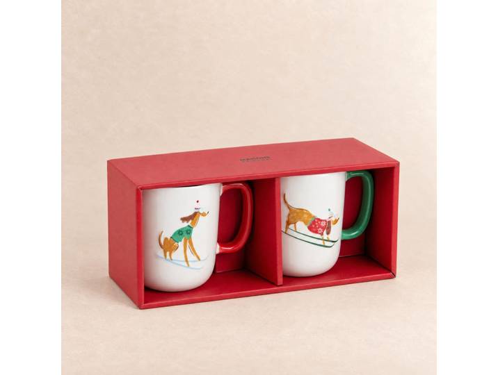 Set aus 2 Porzellantassen mit mehrfarbigen Skihund-Motiven
