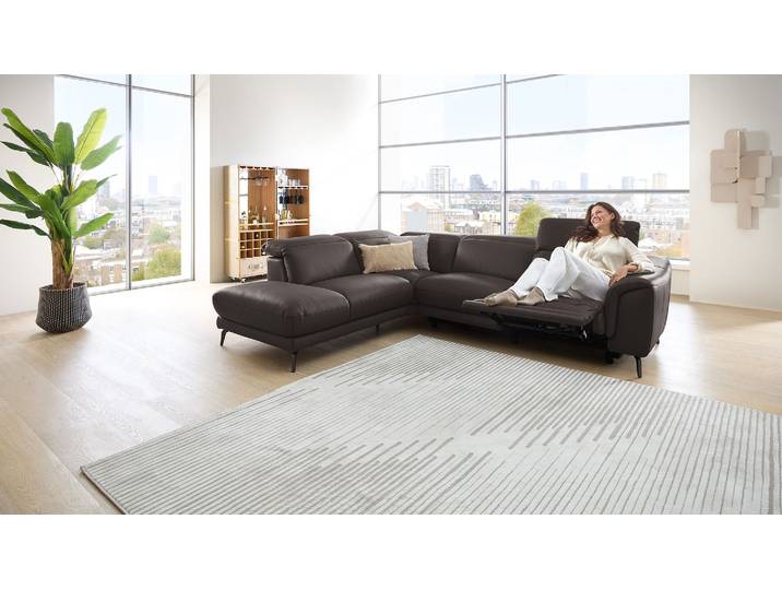 Leder Couch mit motor. Relaxfunktion und Kopfteilverstellung