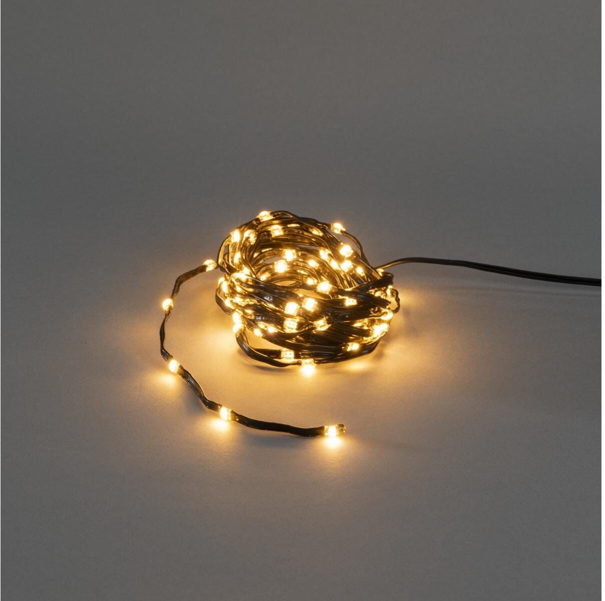 KONSTSMIDE LED-Lichterkette "Micro Shine 100 bernsteinfarbene LEDs", schwarz, Flammen 100 Stk., Kabellänge 10m, Lichterketten, LED-Lichterkette schwarz Flammen 100 Stk., Kabellänge 10m