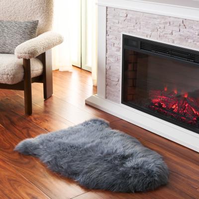 SAFAVIEH Handmade Natural Sheepskin Leanca 3.4-inch Thick Rug