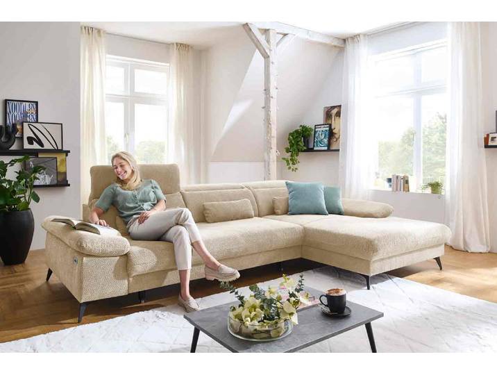Ecksofa mit motorischen XL- Sitzvorzug in Stoff