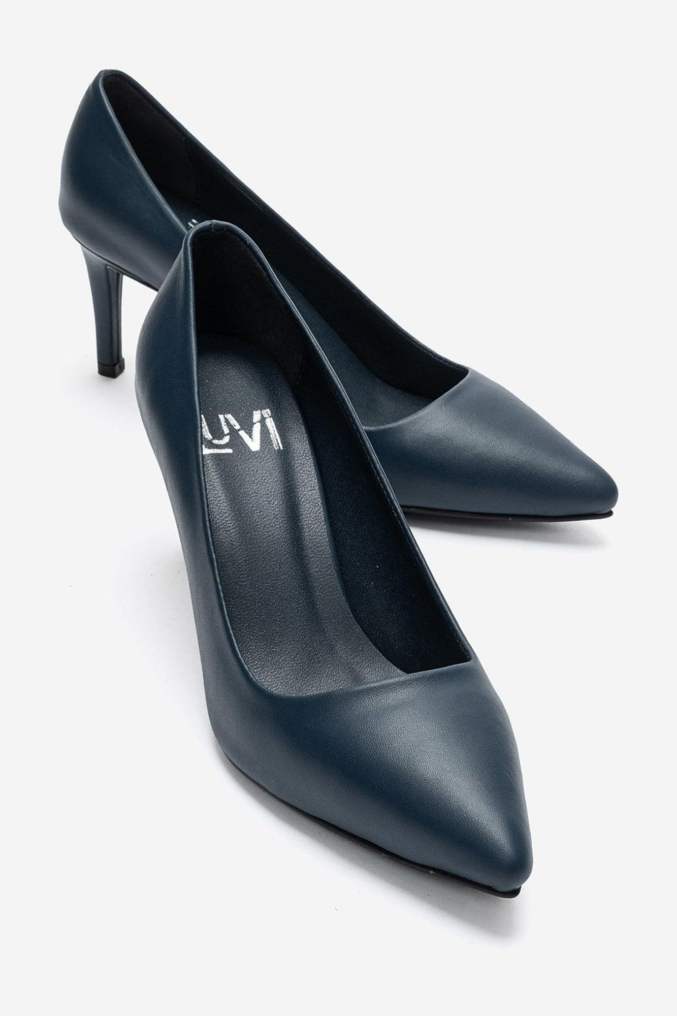 Clyde Leder Stiletto Spitzer Zehn Pumps