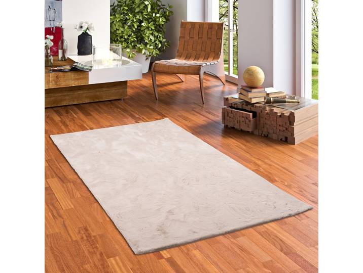 Tapis en fausse fourrure beige 180x250 cm