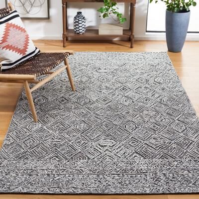 SAFAVIEH Handmade Textual Margund Wool Rug
