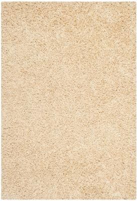 SAFAVIEH Handmade Monterey Shag Mevlide Solid Polyester Rug