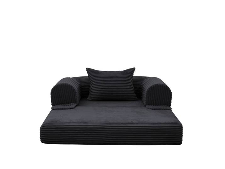 Fauteuil convertible noir avec coussin assorti
