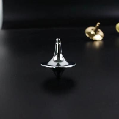 Inspired Finds Metal Gyro Precision Silver Spinning Top With Movie Totem Print silver With Hole