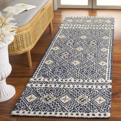 SAFAVIEH Handmade Micro-Loop Jelske Wool Rug
