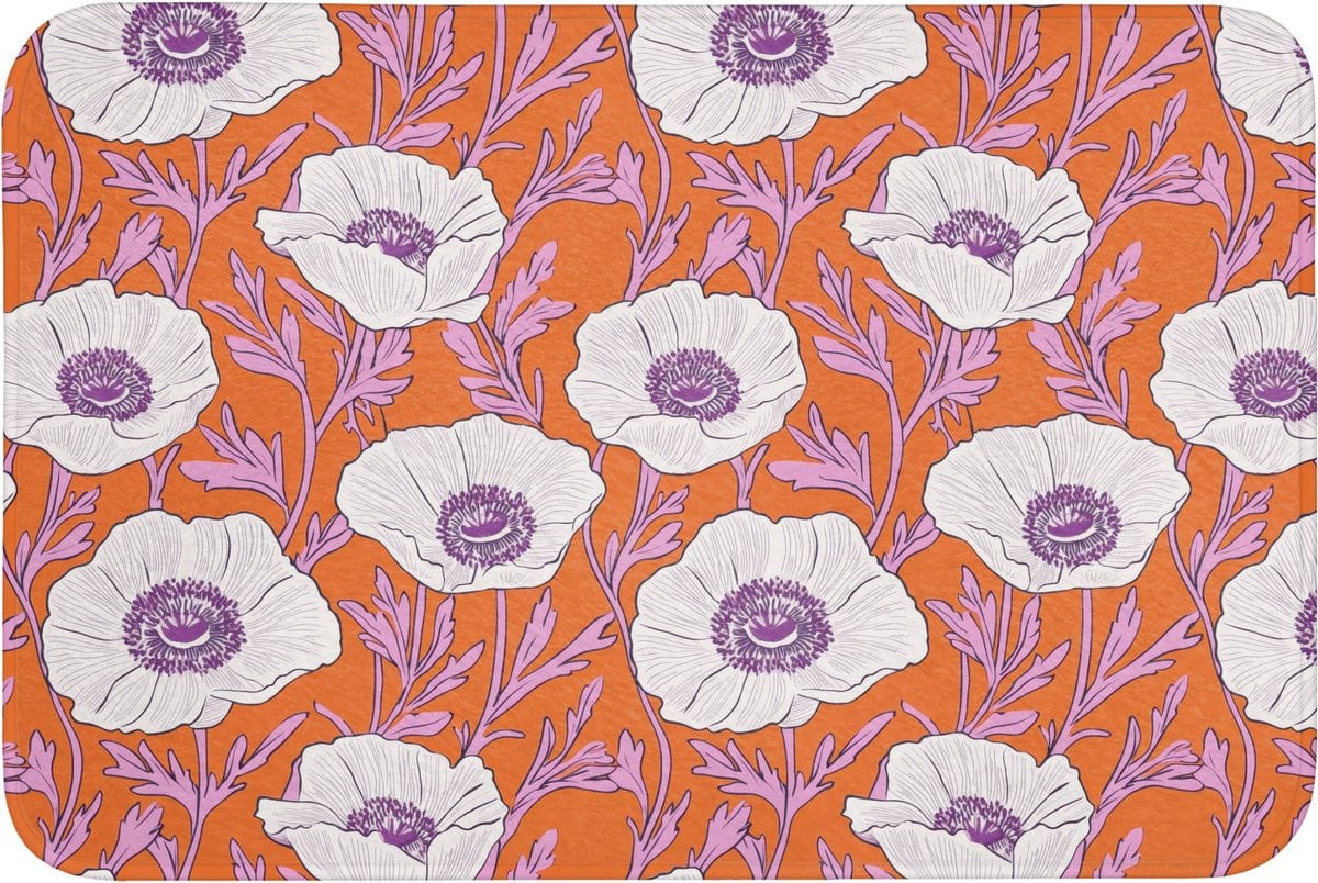 Antislip toiletmat met grafisch bloemenmotief in oranje, 90 x 60 cm