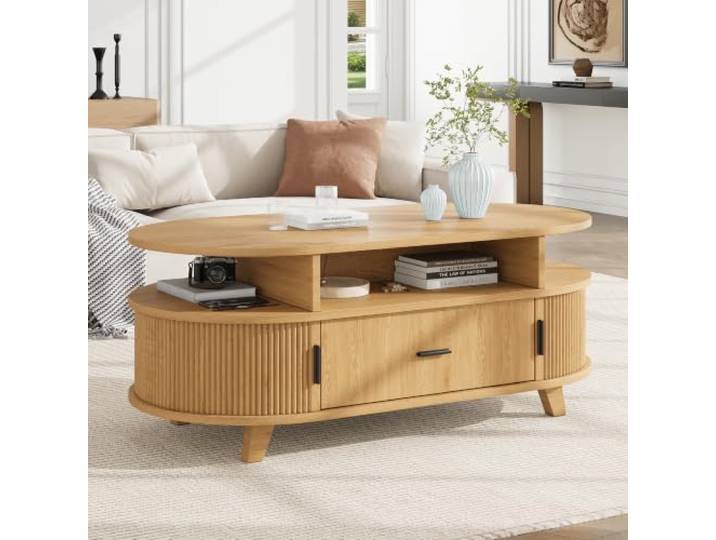 Merax Couchtisch oval 100x50x40 cm, Holzoptik, Schublade & 2 Rolltüren Ovaler Couchtisch in Holzoptik mit Schublade, 2 Rolltüren und offenen Fächern für praktischen Stauraum.