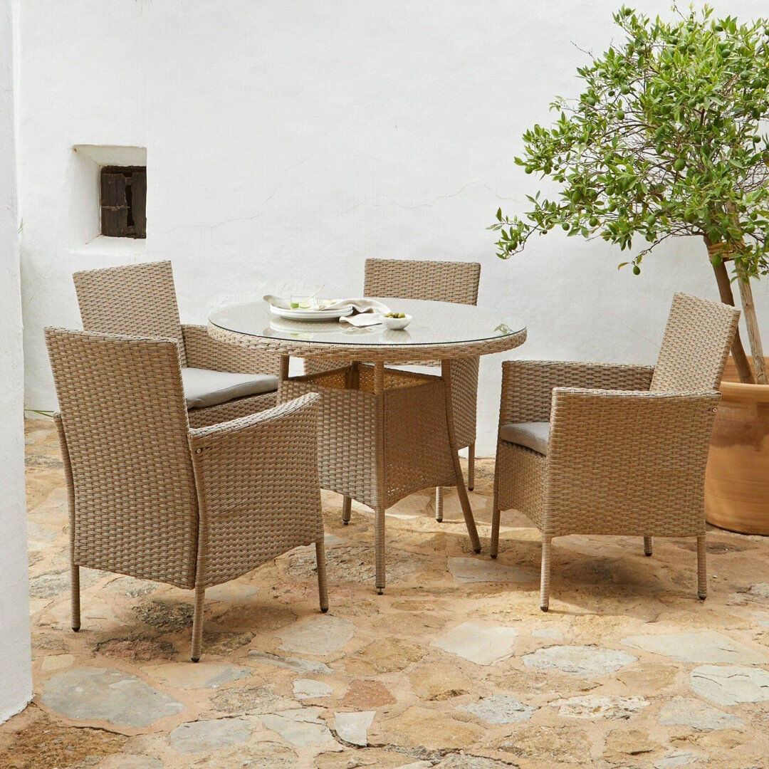 Lark Manor Dubose 4 - Person Patio Dining Set Umbrella Hole Included Round Table with Cushions Included Brown 4