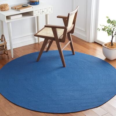 SAFAVIEH Handmade Braided Thanja Rug