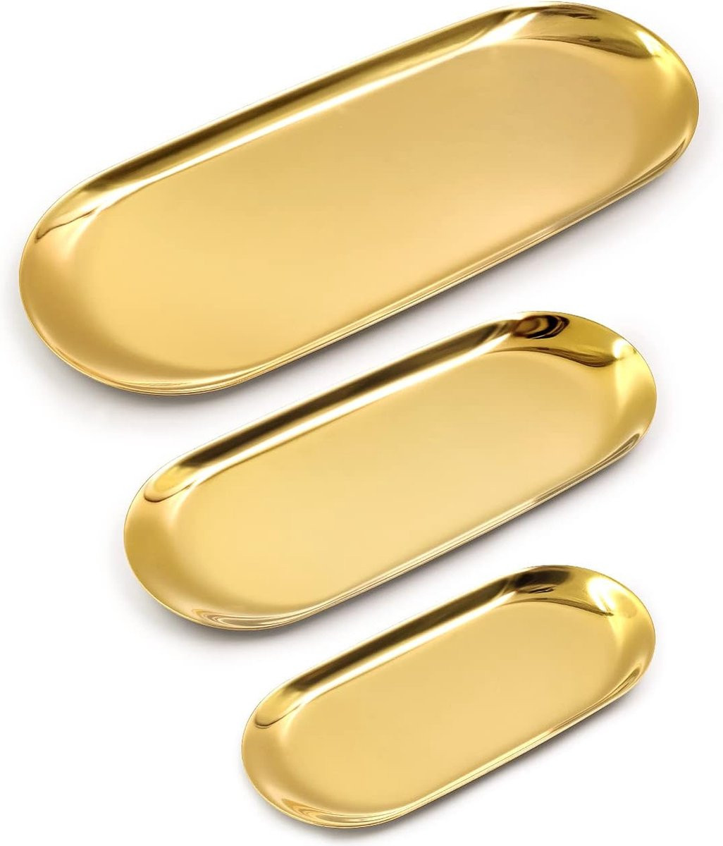 Gouden ovaal dienblad en buffetschaal voor decoratie of sieraden