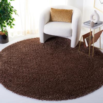 SAFAVIEH Handmade Monterey Shag Mevlide Solid Polyester Rug