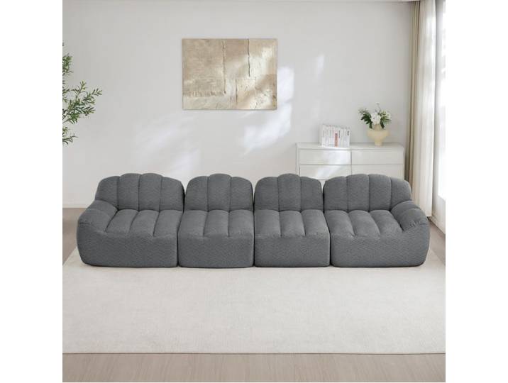 Canapé modulaire 4 places gris en fleece granulé avec ottoman
