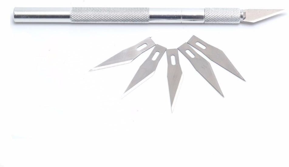 Coreparts Scalpel / knife for cutting.