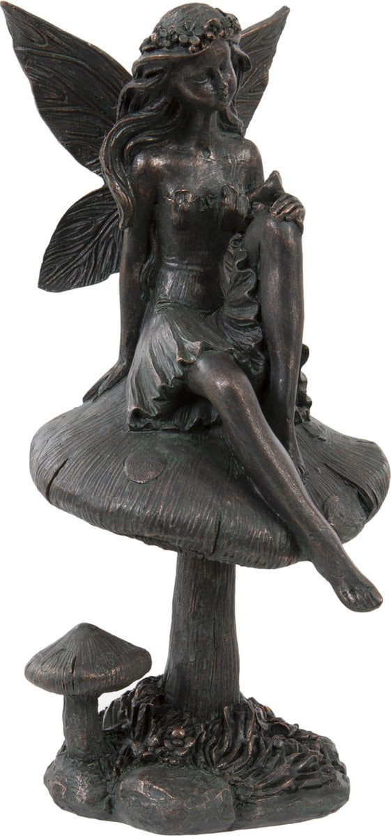 Decoratief figuur elf op paddenstoel voor op tafel
