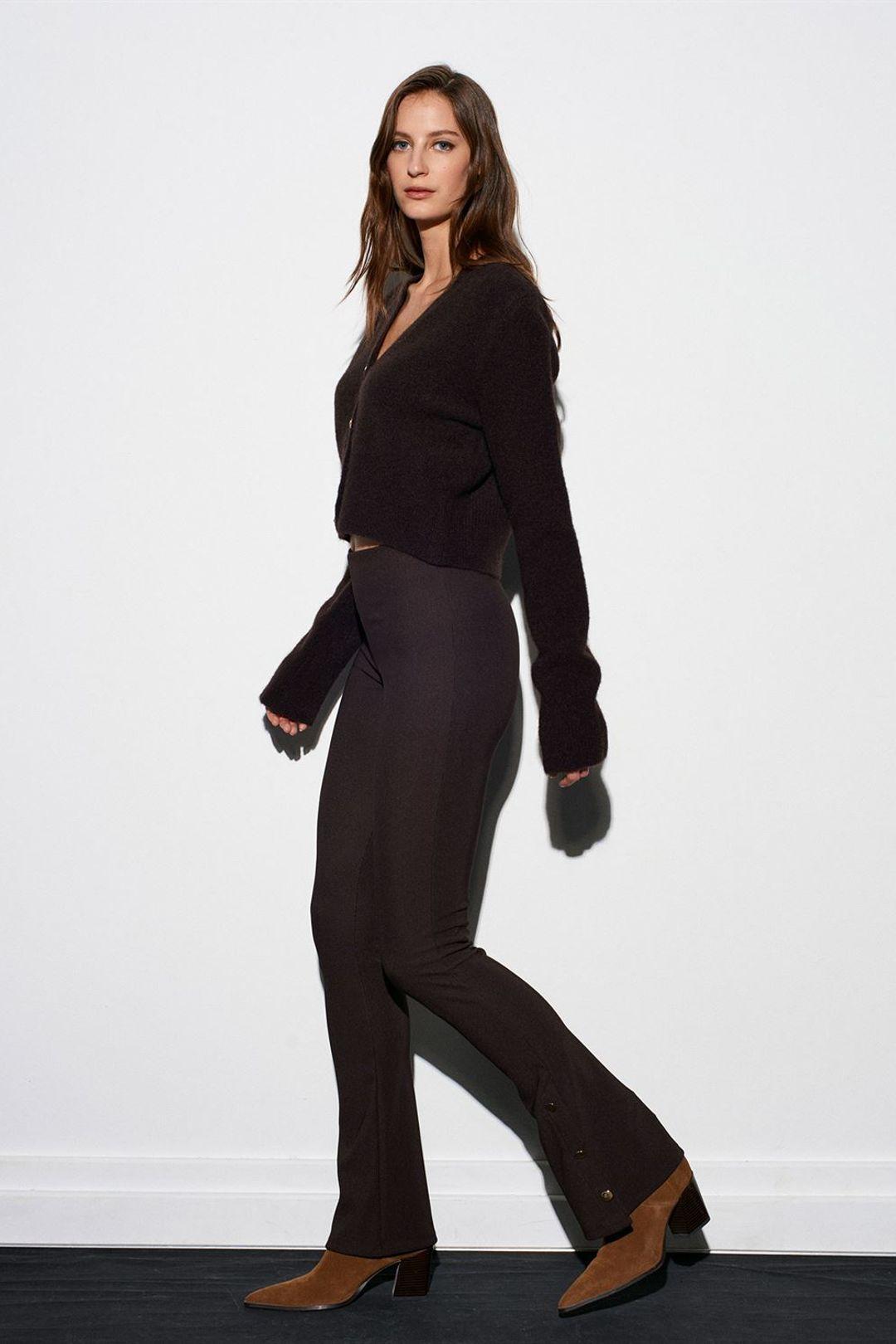 Hoge taille flare leggings met knoopdetail