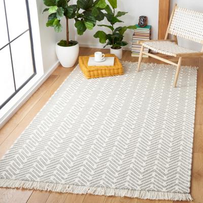 SAFAVIEH Handmade Natura Emmi Wool Fringe Rug