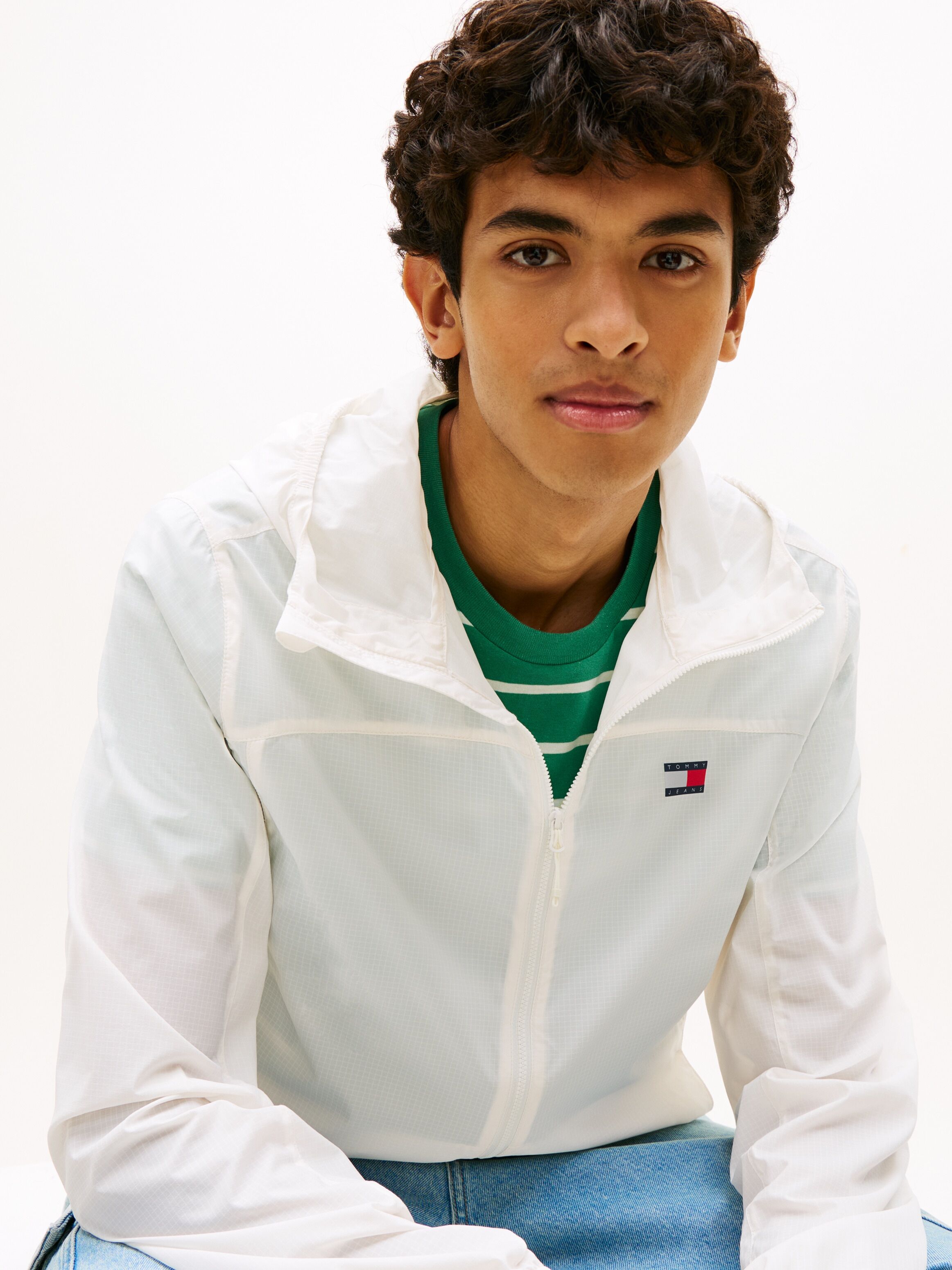 Tommy Jeans "TJM OUTDOOR SHELL" mit Kapuze Windsheeter Windjacke Packable Fahrradjacke Regular fit mit Kapuze ecru L