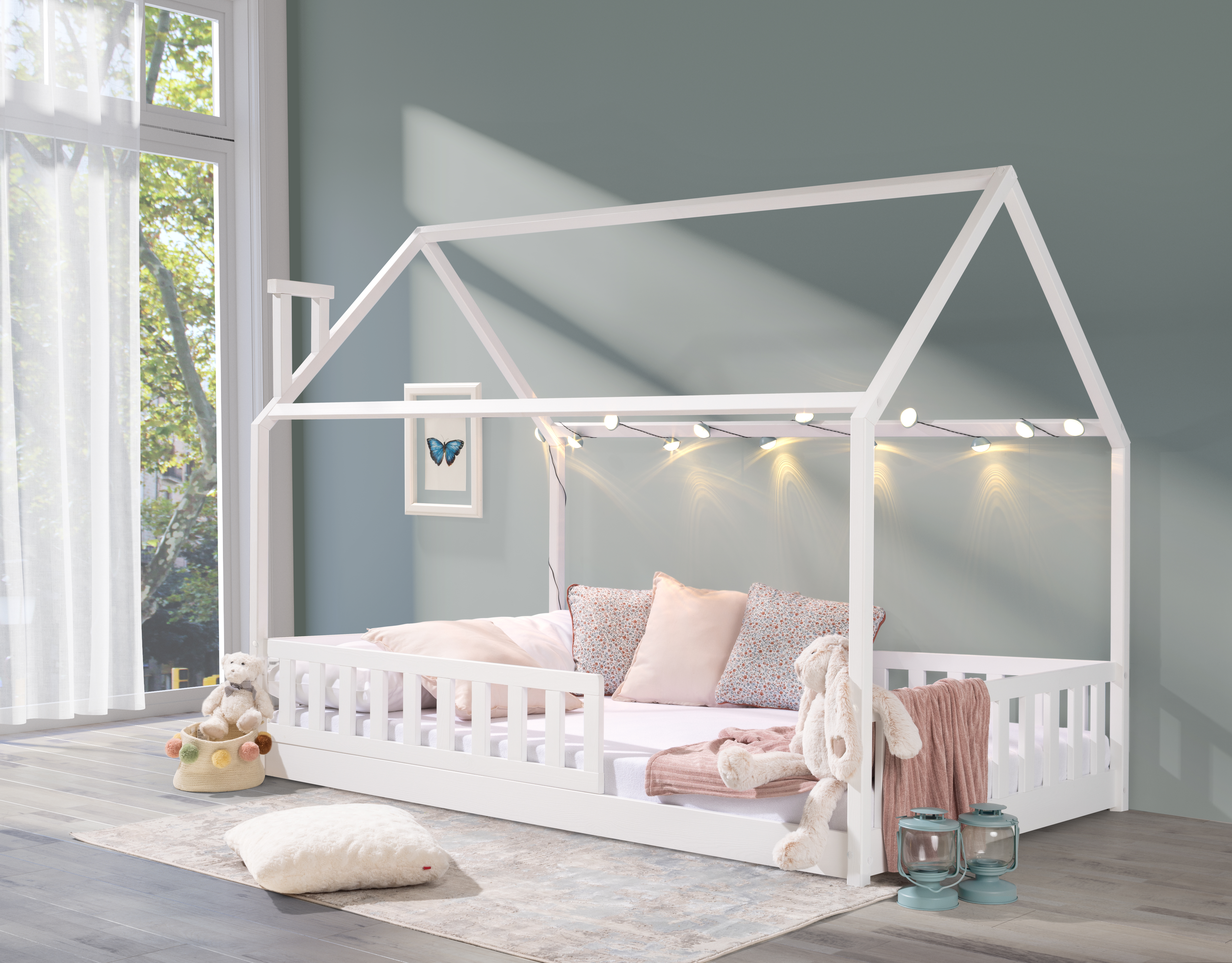 Hausbett "Kinderbett ROSI PLUS 120x200 Weiß Kiefer" (Einzelbett mit Lattenrost und abnehmbarem Rausfallschutz)