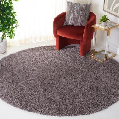 SAFAVIEH Handmade Monterey Shag Mevlide Solid Polyester Rug