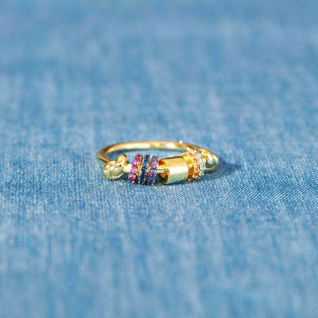INF Anti-Stress-Ring mit rotierenden Perlen