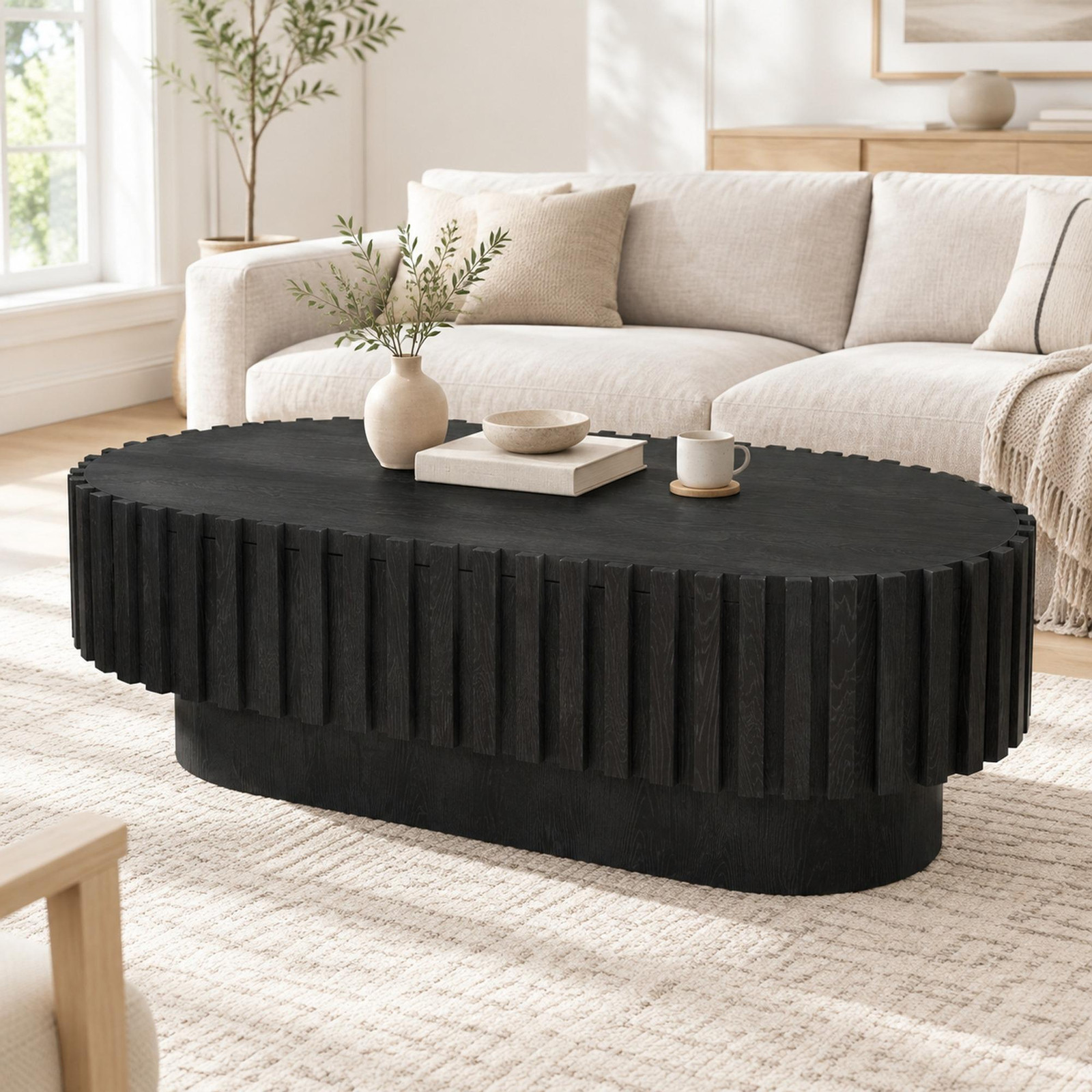 Okwish ovale salontafel met lade en decoratief lamellenfront, zwart
