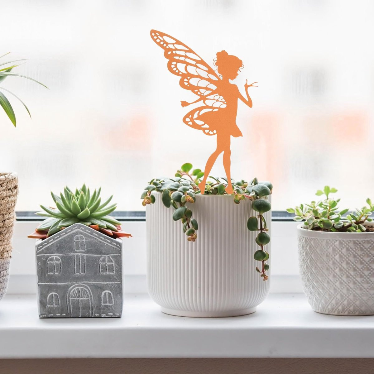 Weerbestendige zittende elf tuinsteker met roestlook voor in de tuin of op het balkon