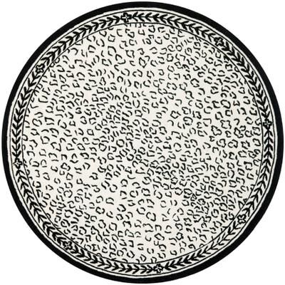 SAFAVIEH Handmade Chelsea Cayla Leopard French Country Wool Rug